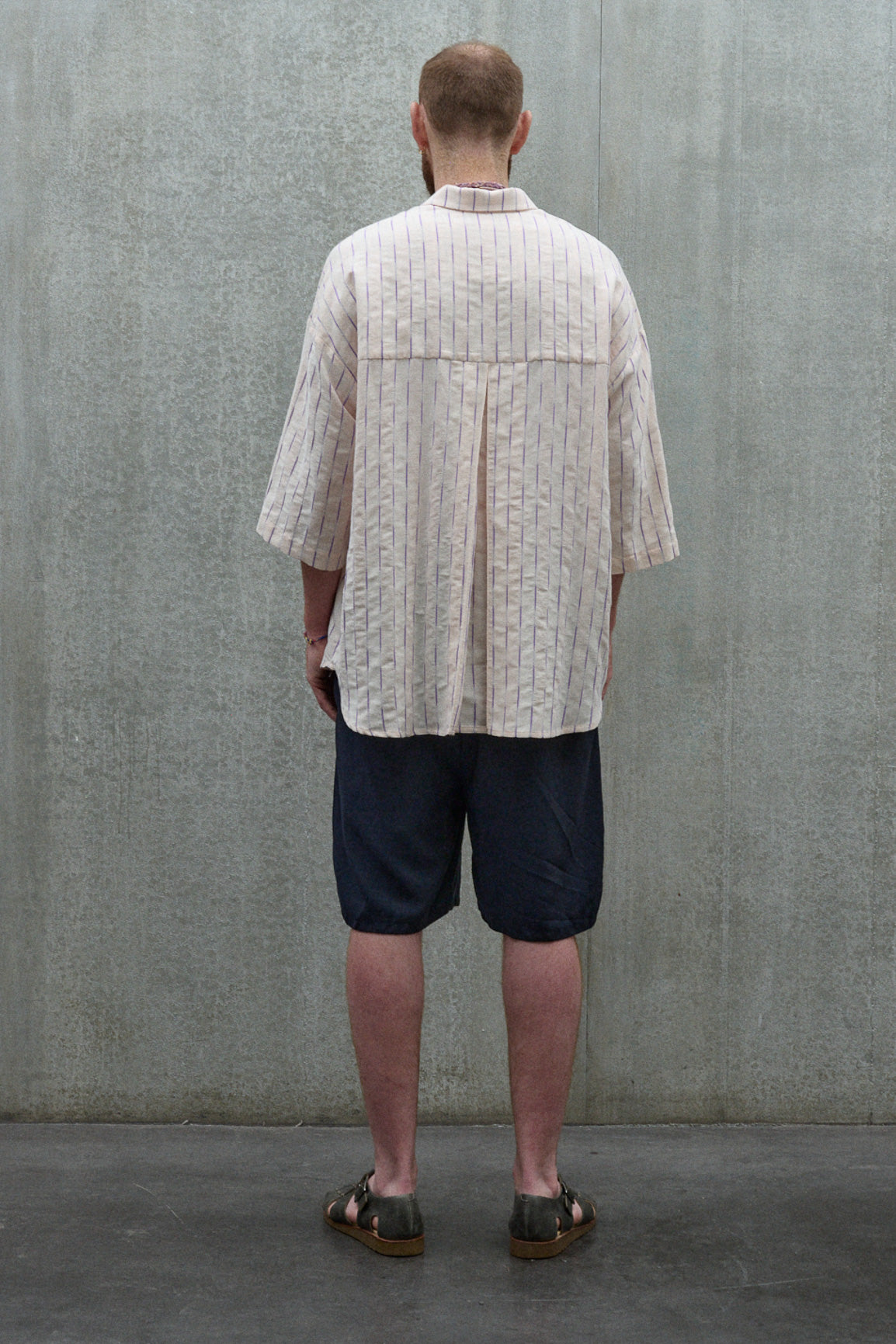 Chemise arrondie rose à rayures