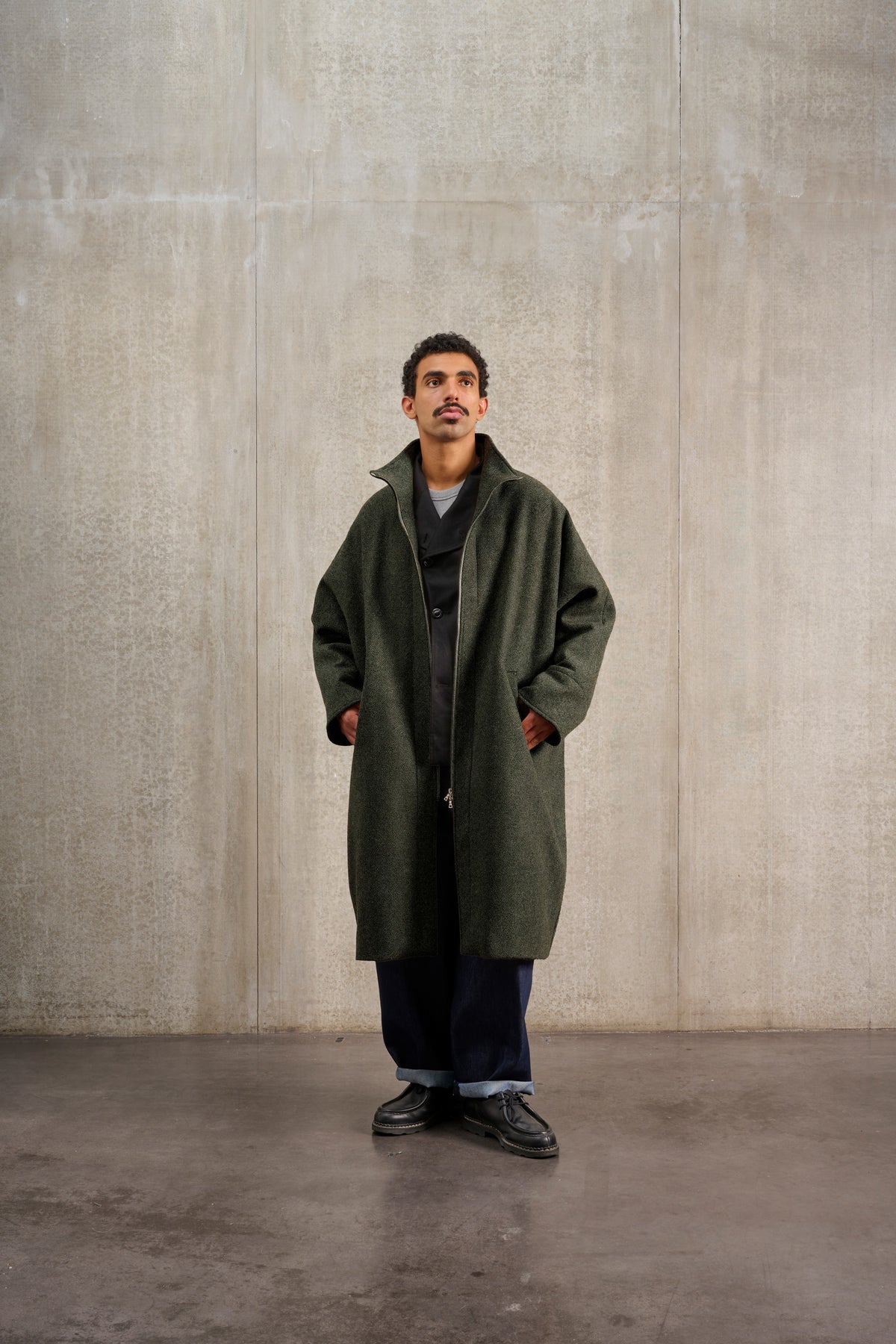 TANZEN – Long coat in green herringbone double-faced wool cloth